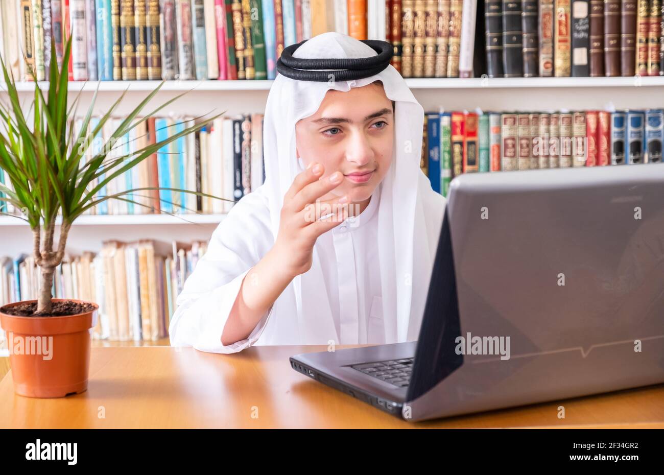 Aarabic muslim man using online technology Stock Photo