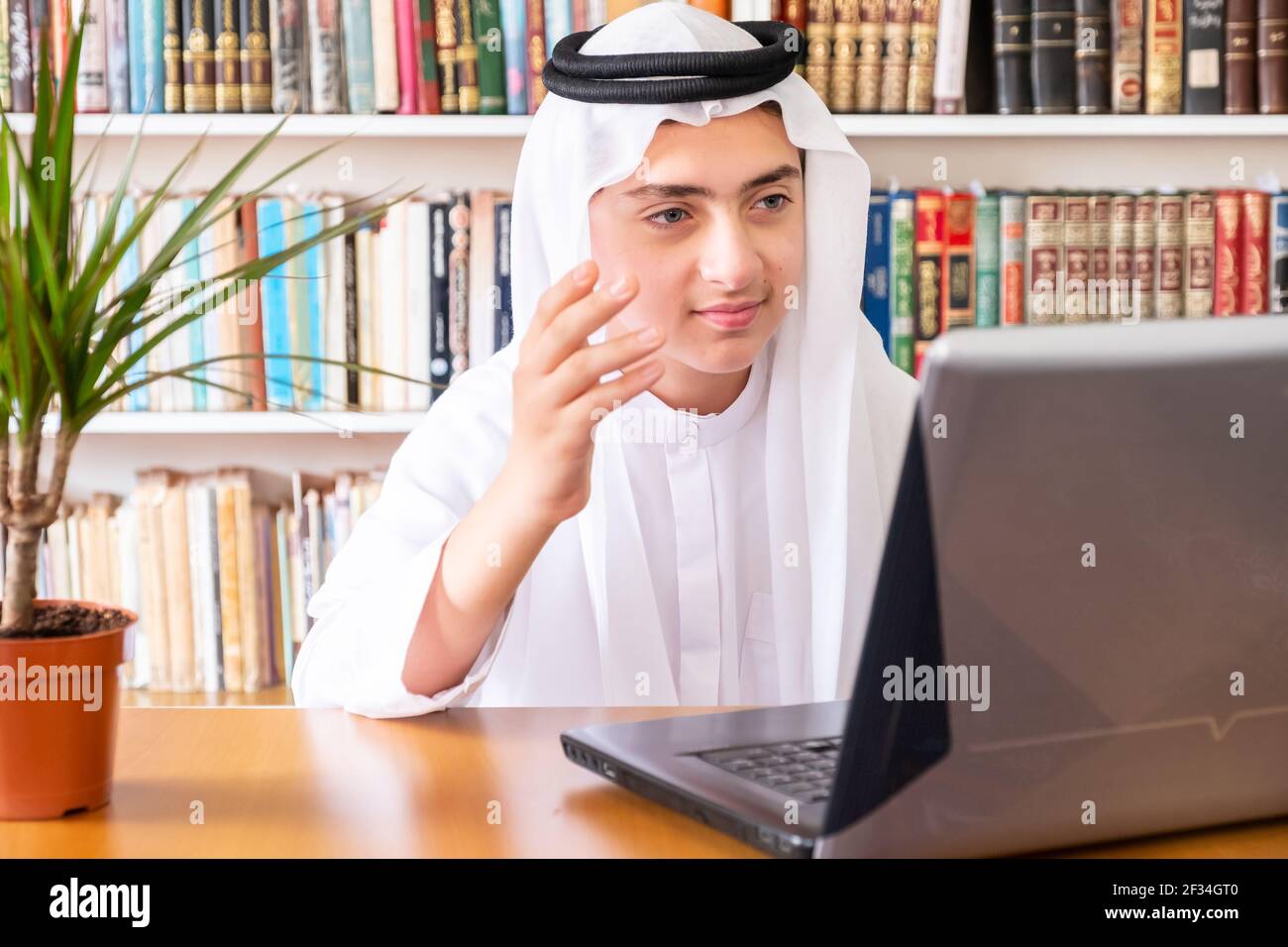 Aarabic muslim man using online technology Stock Photo