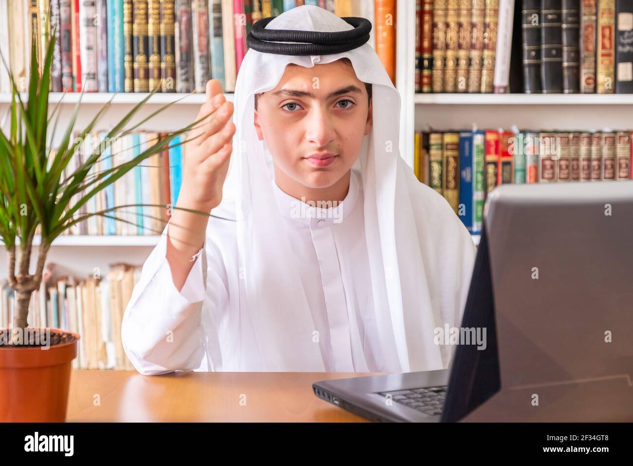 Aarabic muslim man using online technology Stock Photo