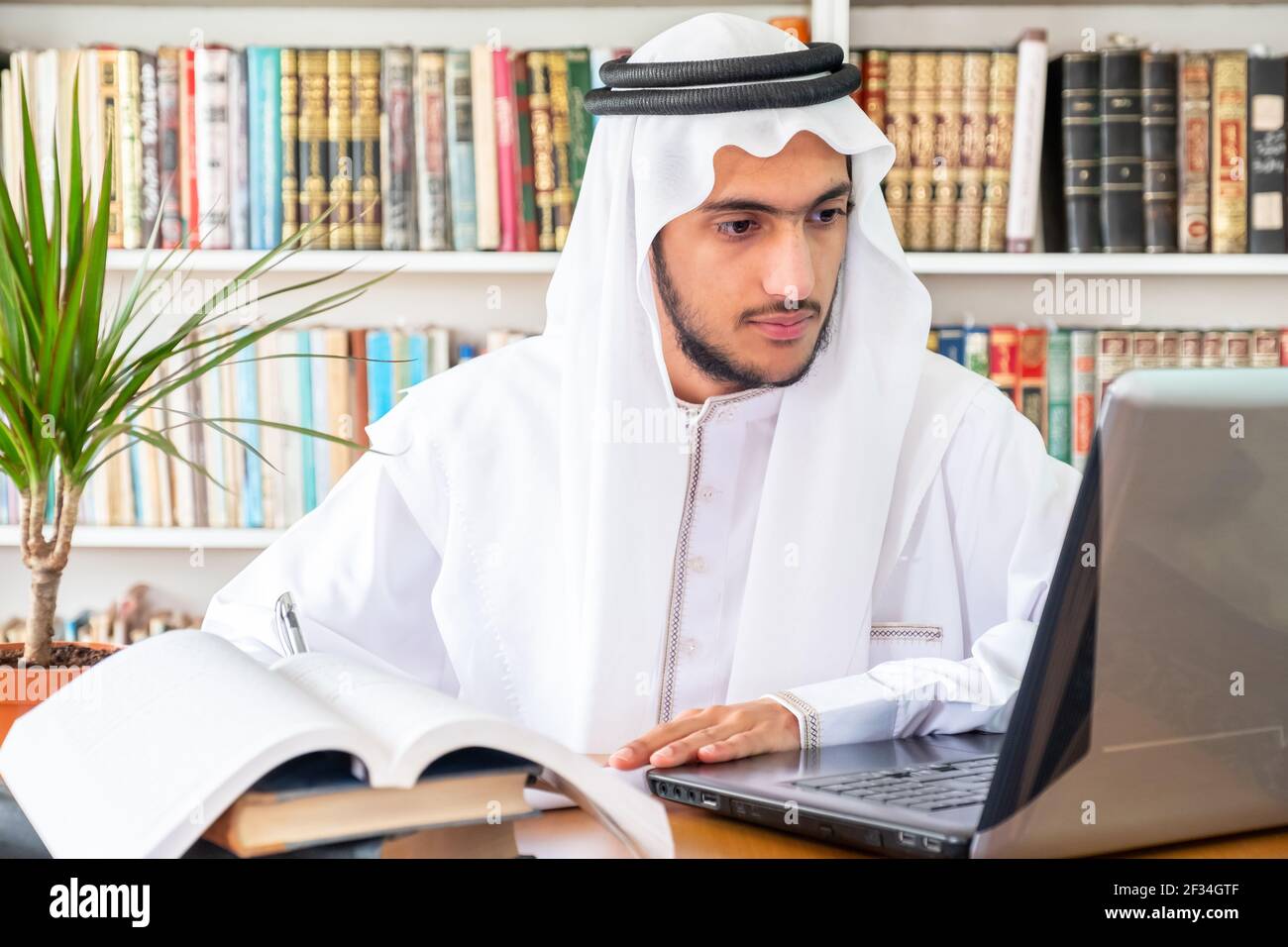 Arabic Muslim student studying online Stock Photo - Alamy