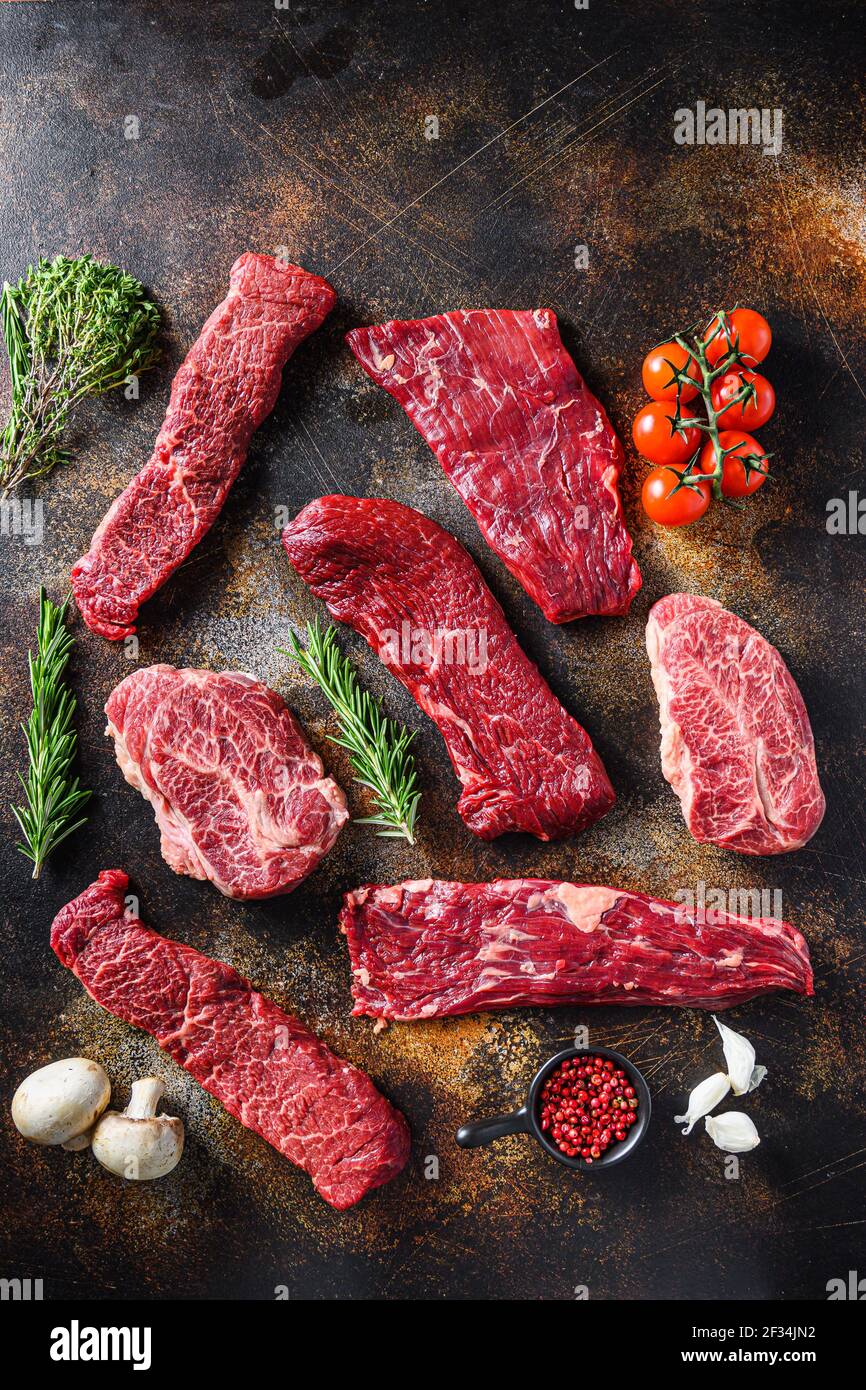 Set of fresh raw alternative beef steaks flap flank Steak, machete