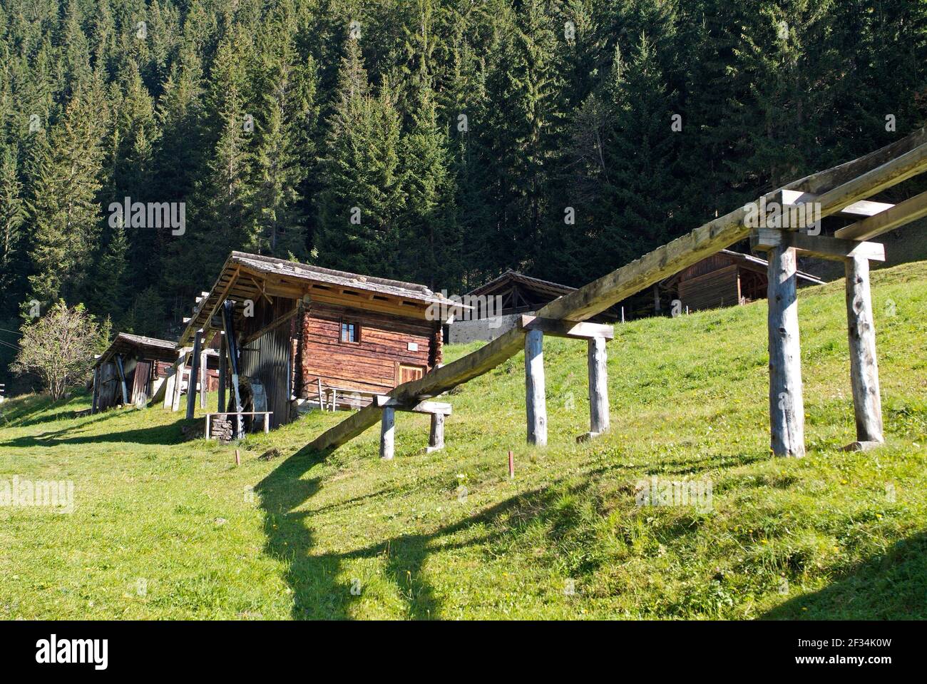 Austria, some of the five water mills in Maria Luggau with wooden gutters and wooden shingle roofs Stock Photo