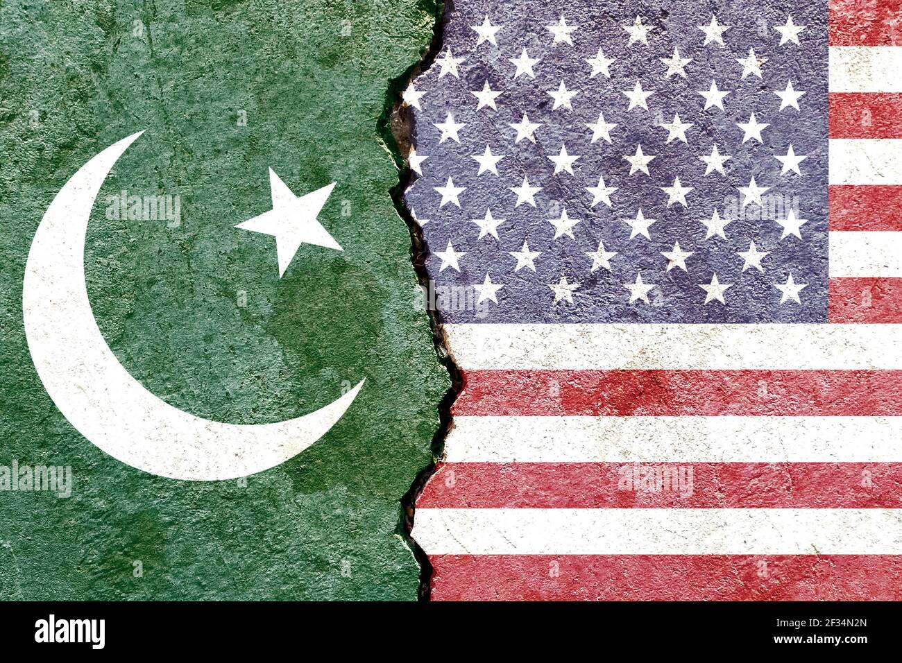 An overlay of the Pakistani and American flags on a weathered cracked wall background. Argentina versus USA a concept Stock Photo