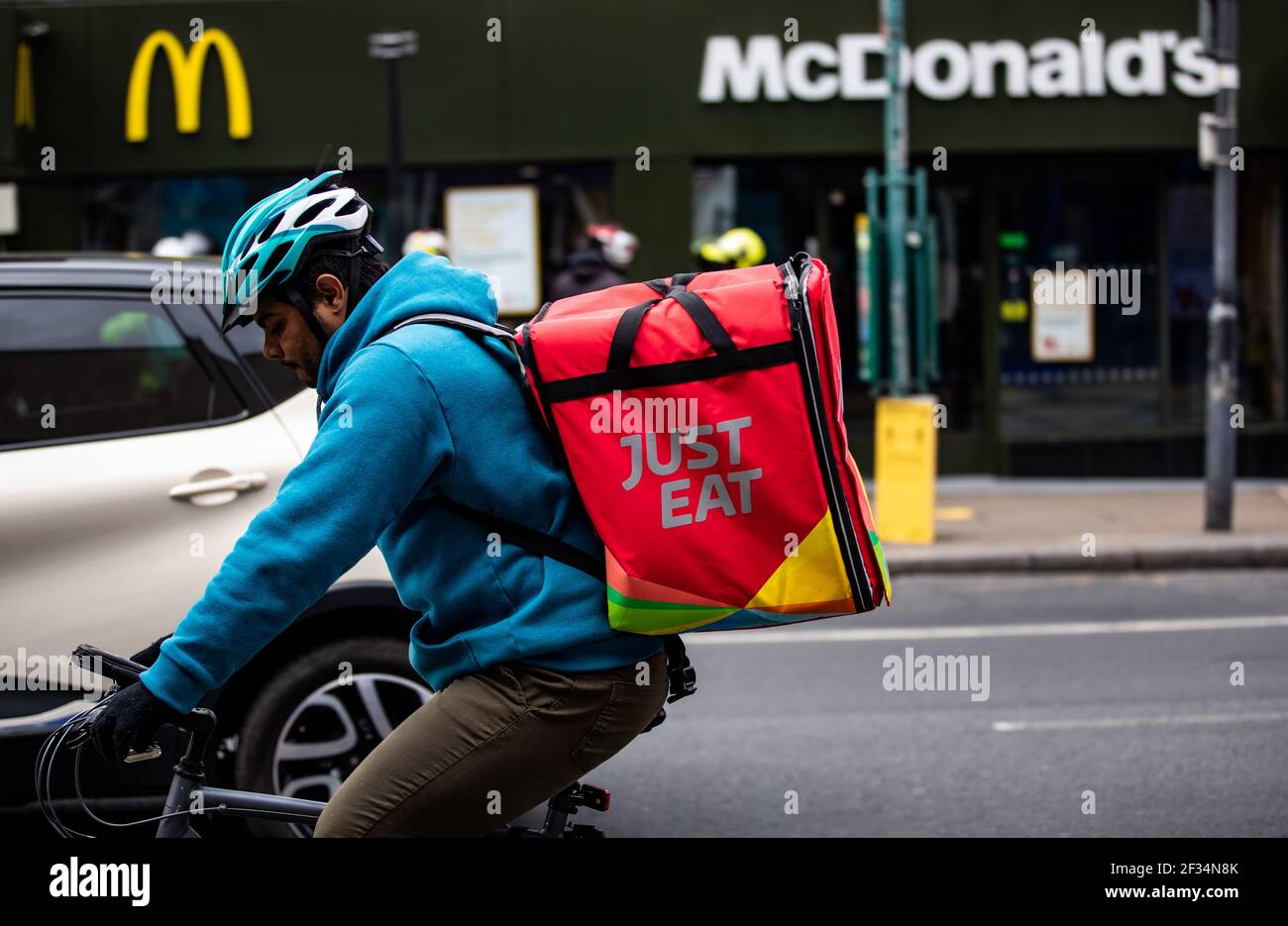 Delivery riders waiting outside McDonald’s in Tooting, South London ...