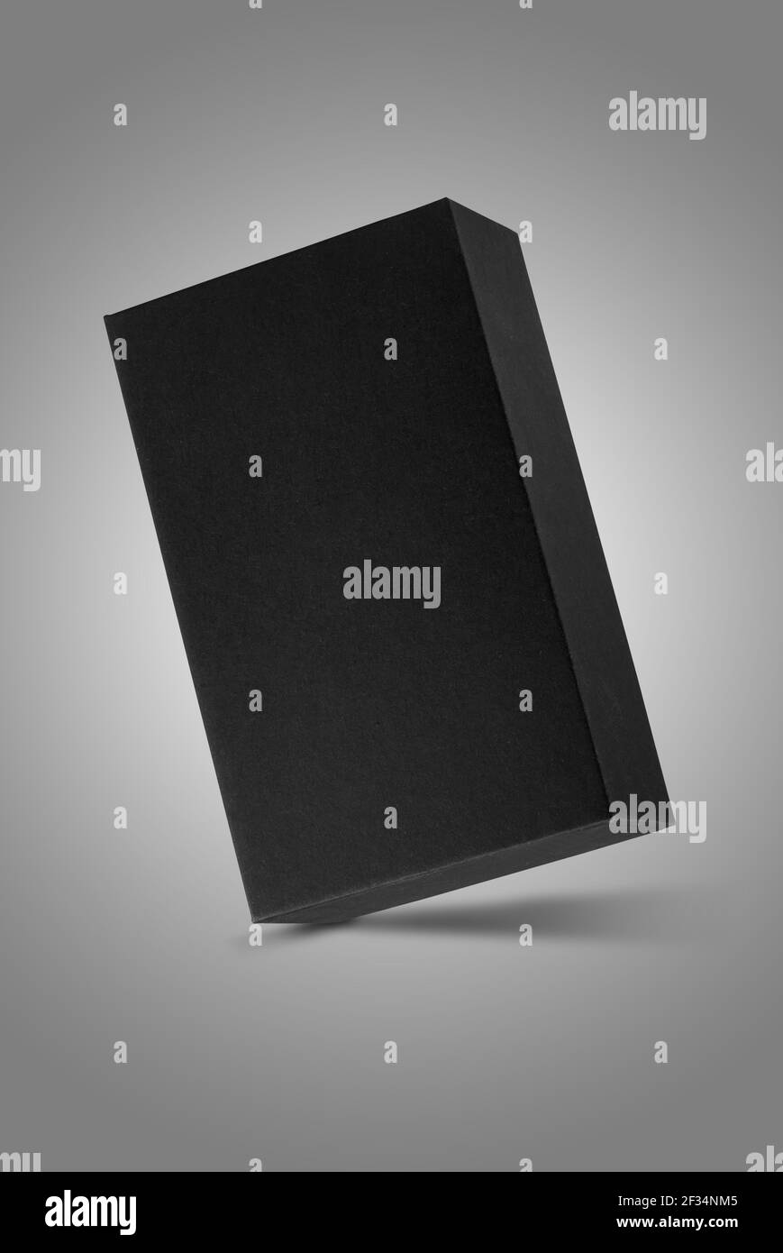 Studio shot of a Small black box floating on gradient white and gray background Stock Photo