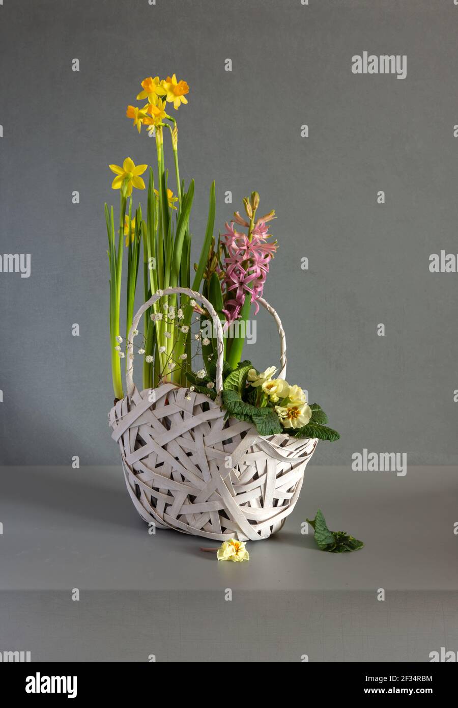 Flower arrangement in a wicker basket. Vintage Stock Photo Alamy