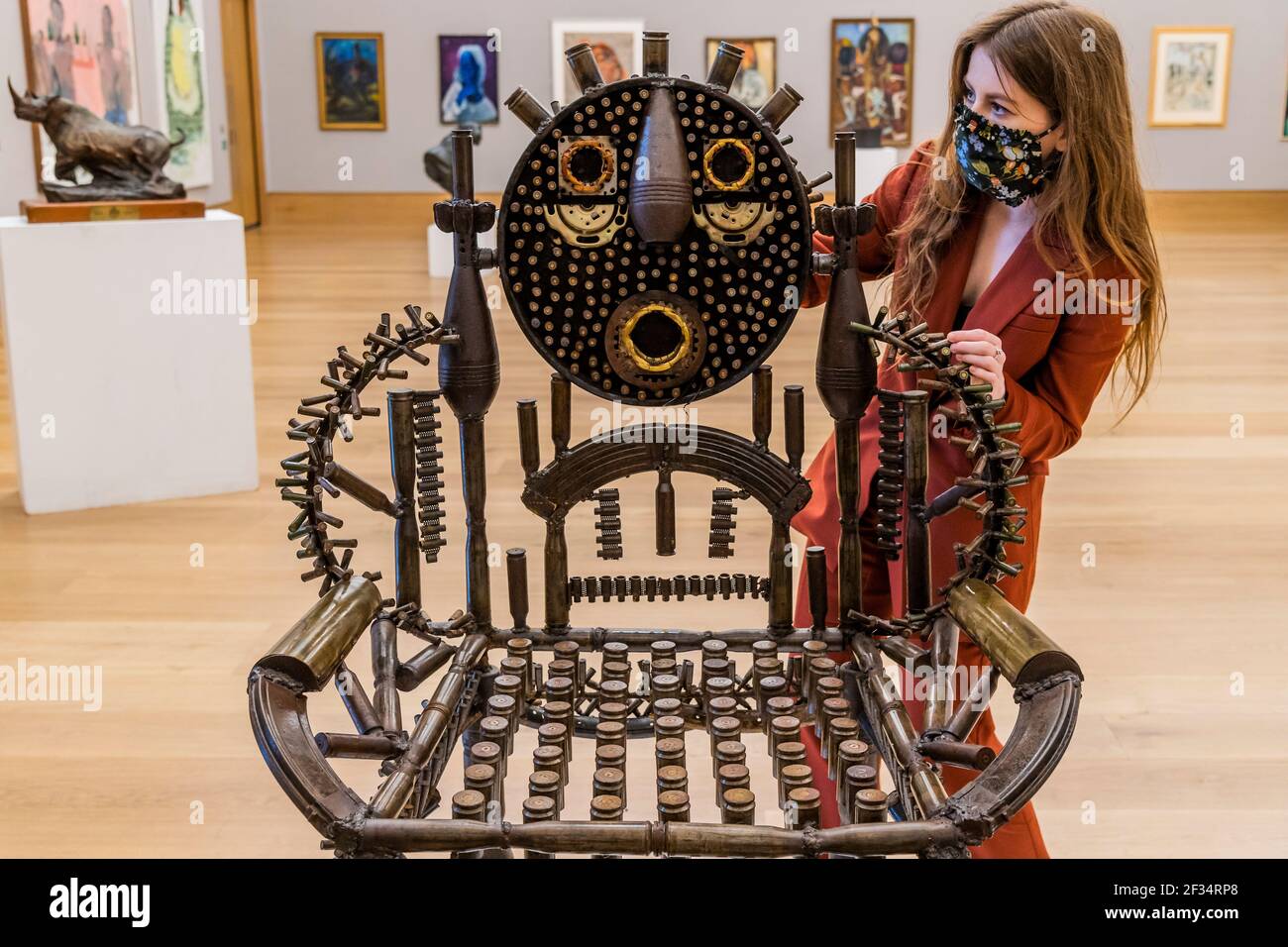 London, UK. 15th Mar, 2021. Gonçalo Mabunda, Throne, est £ 3,000 - 5,000 - Preview of Bonhams' Modern & Contemporary African Art sale at Bonhams New Bond Street. The sale itself will take place on Wednesday 17 March. Credit: Guy Bell/Alamy Live News Stock Photo