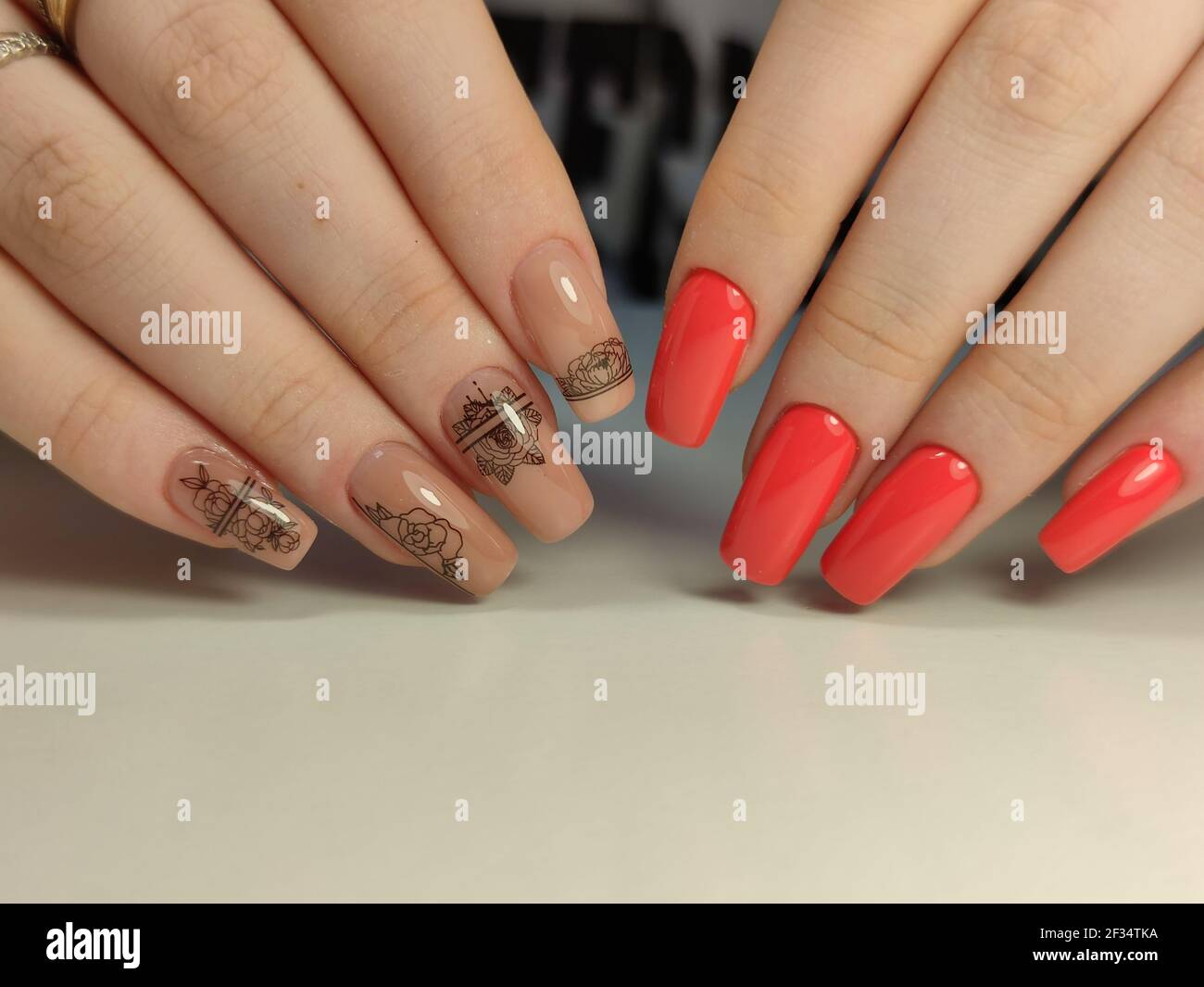 beautiful manicure of nails on the background of a fashionable texture Stock Photo