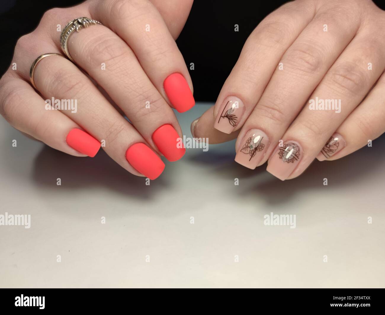 beautiful manicure of nails on the background of a fashionable texture Stock Photo