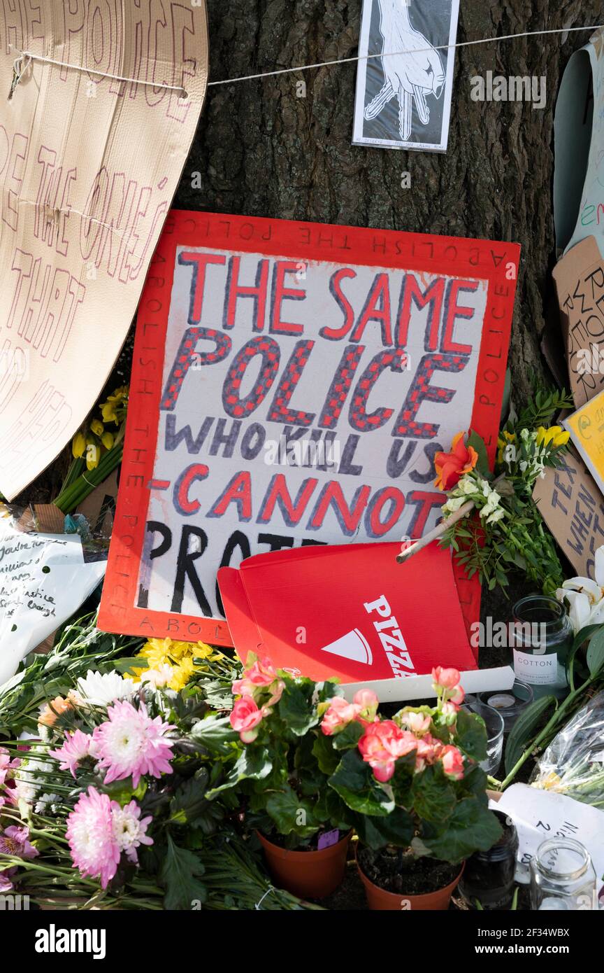 Brighton UK 15th March 2021 - Floral tributes and messages for murder victim Sarah Everard and some anti police messages left at Valley Gardens in Brighton where a candlelit vigil was held on Saturday :  Credit Simon Dack / Alamy Live News Stock Photo