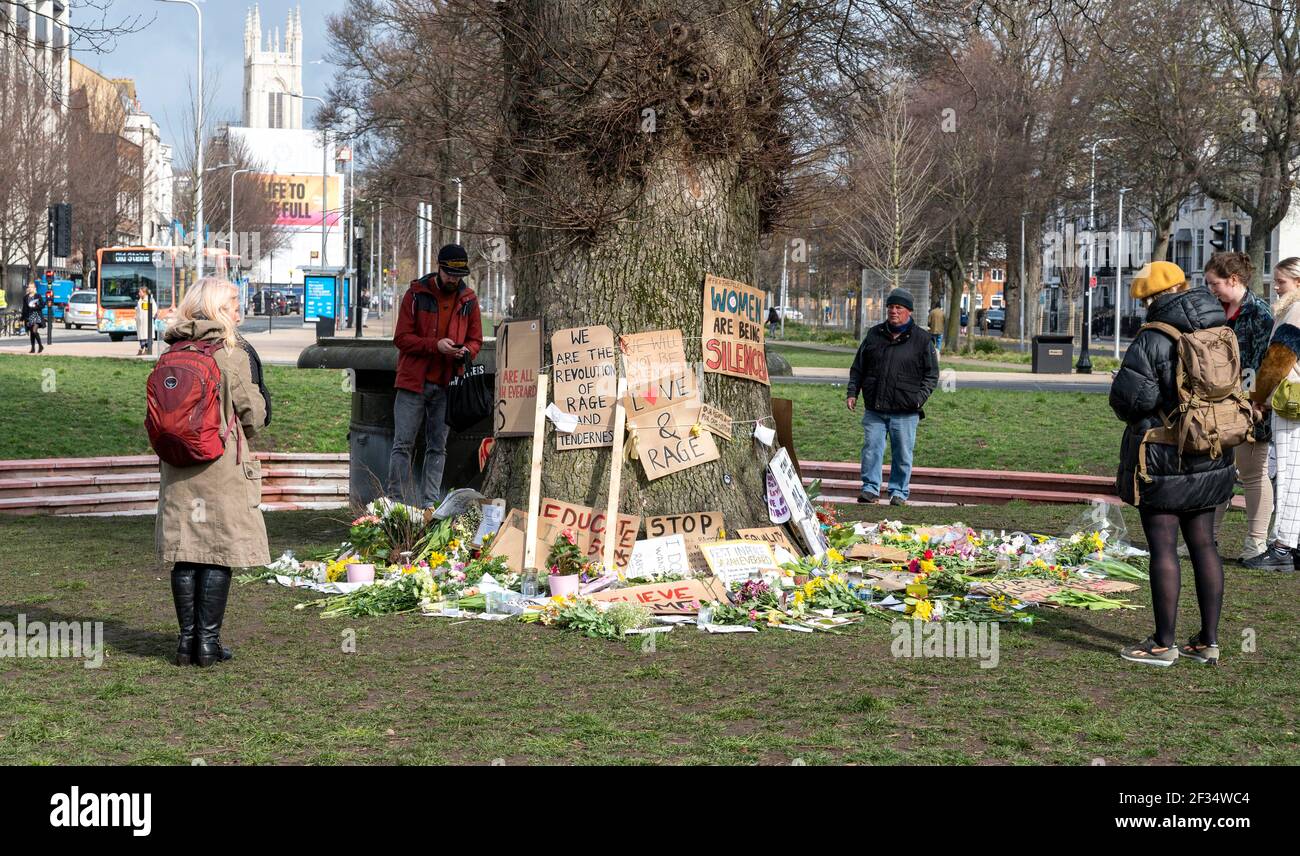 Brighton UK 15th March 2021 - Floral tributes and messages for murder victim Sarah Everard and some anti police messages left at Valley Gardens in Brighton where a candlelit vigil was held on Saturday : Credit Simon Dack / Alamy Live News Stock Photo