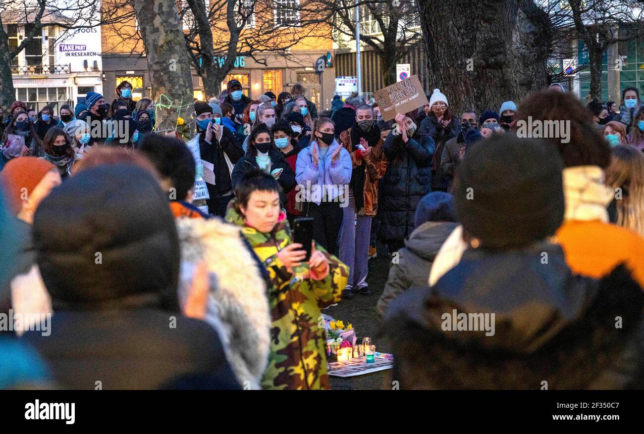 Brighton UK 13th March 2021 - Hundreds of people take part in a candlelit vigil for murder victim Sarah Everard in Brighton this evening . Reclaim These Streets protesters gathered in Brighton's Valley Gardens to take part in the vigil before police started to move them on after about half an hour:  Credit Simon Dack / Alamy Live News Stock Photo