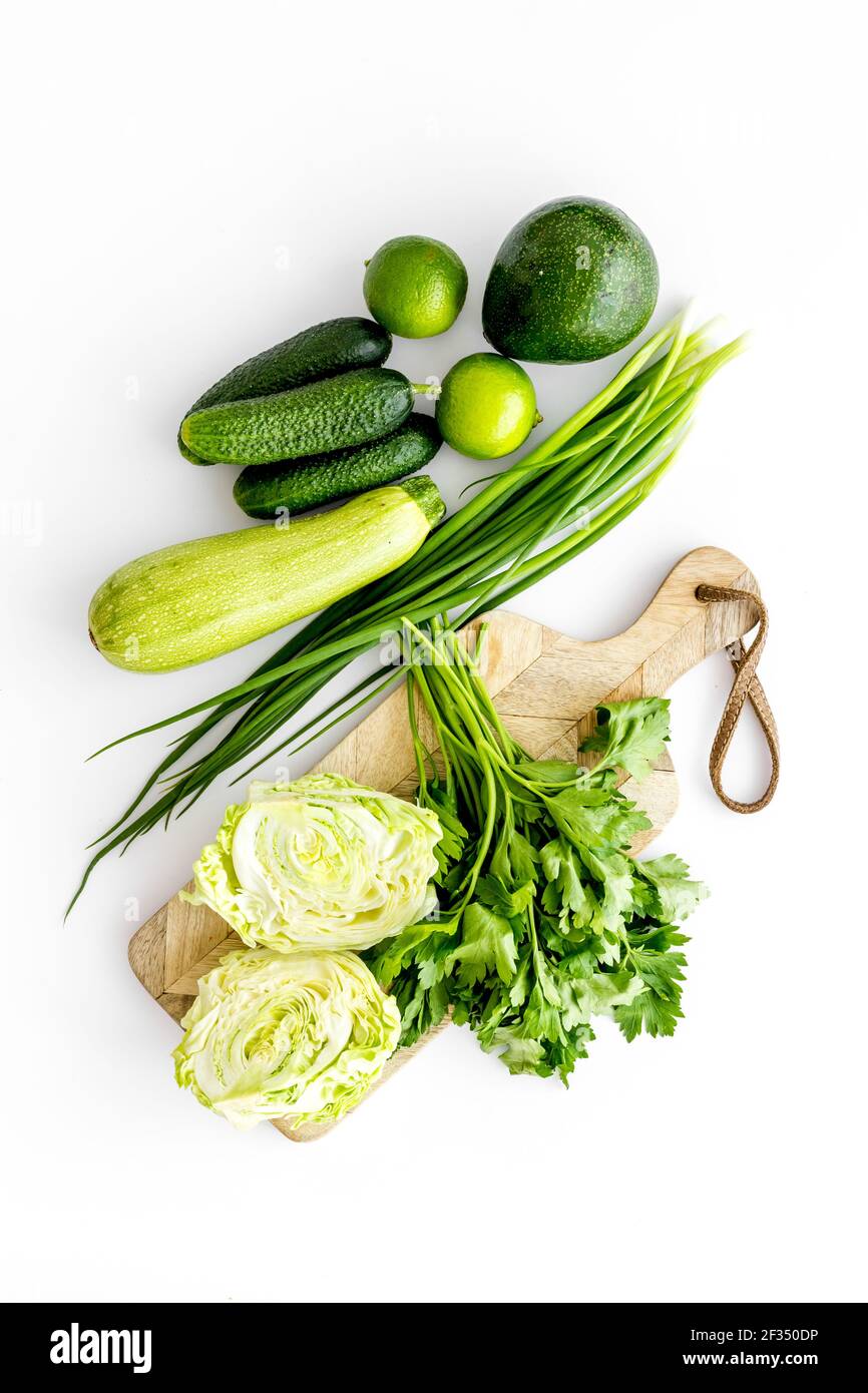 Layout of raw green vegetables, top view Stock Photo - Alamy