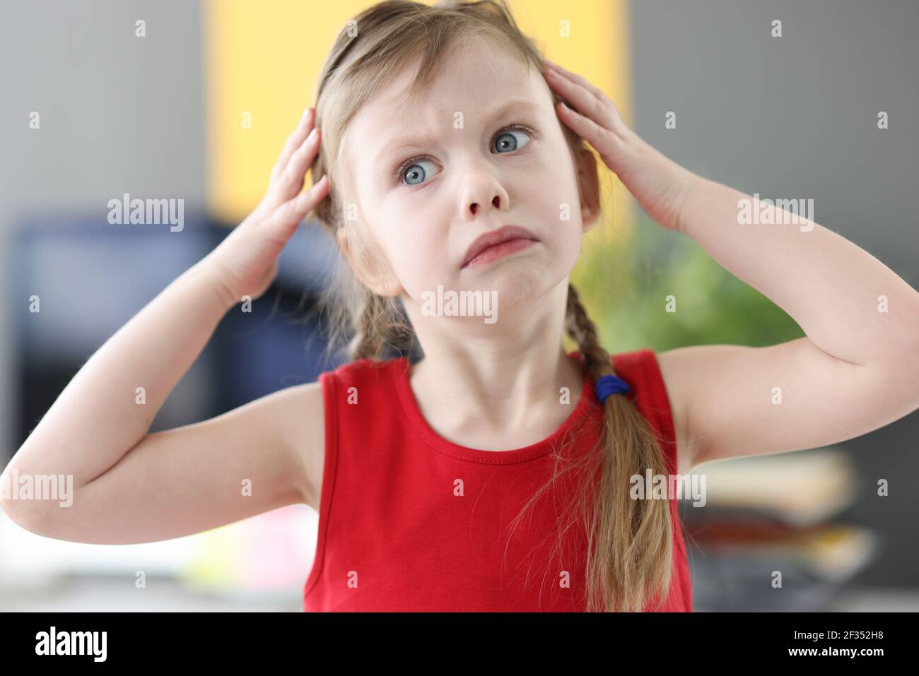 Portrait of surprised little girl with blue eyes Stock Photo - Alamy