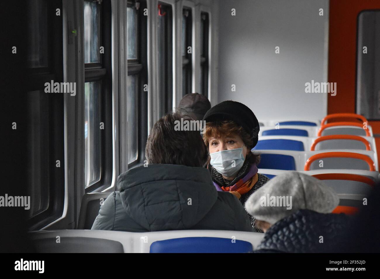 KYIV, UKRAINE - MARCH 15, 2021 - Passengers are seen on the upgraded Sviatoshyn-Bucha suburban train that has been launched as part of the City Expres Stock Photo