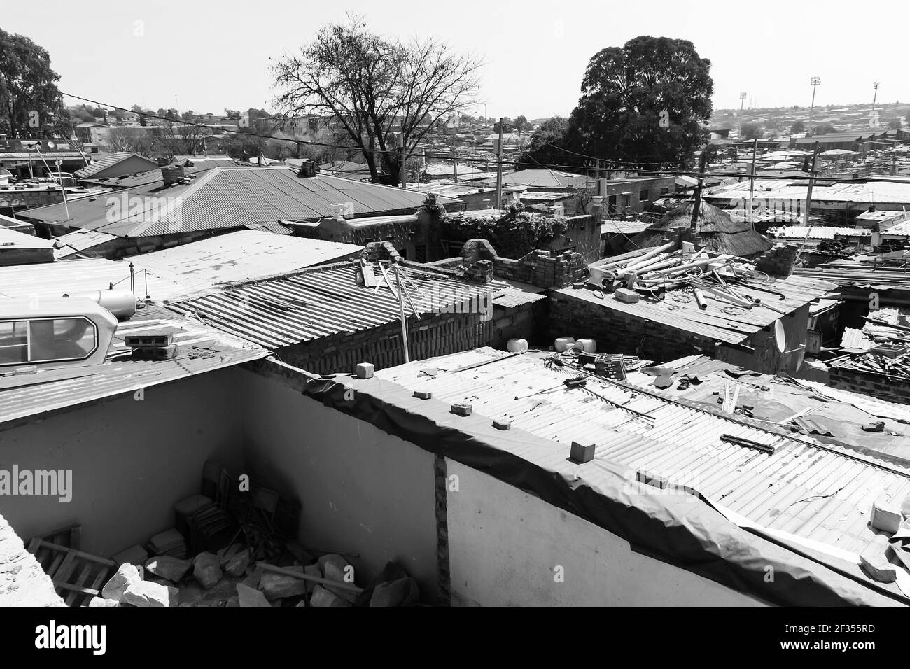 JOHANNESBURG, SOUTH AFRICA - Mar 13, 2021: Johannesburg, South Africa - August 29 2013: High Angle rooftop view of low income houses in Alexandra town Stock Photo