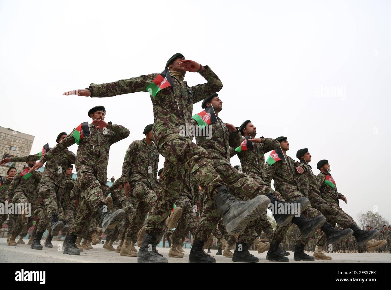 Kabul, Afghanistan. 15th Mar, 2021. Afghan soldiers take part in their graduation ceremony in Kabul, Afghanistan, March 15, 2021. A total of 1,057 newly graduated soldiers have been commissioned to the Afghan national army here on Monday. Credit: Sayed Mominzadah/Xinhua/Alamy Live News Stock Photo