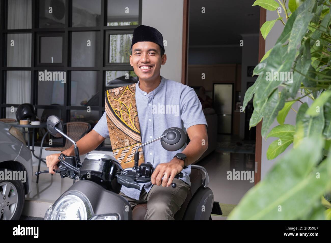 Muslim riding motorcycle hi-res stock photography and images - Alamy