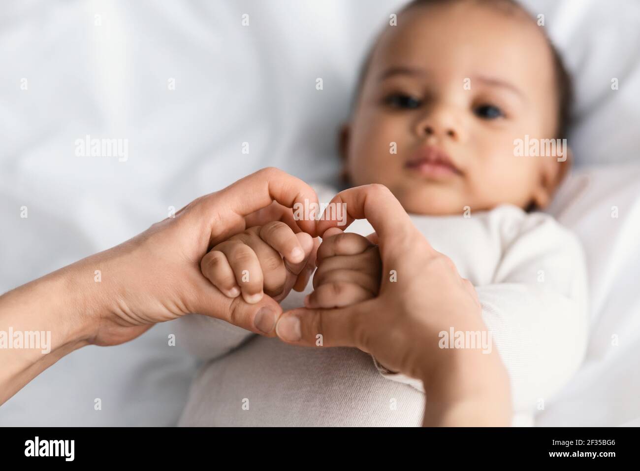 Closeup of cute little African American baby's hands Stock Photo Alamy