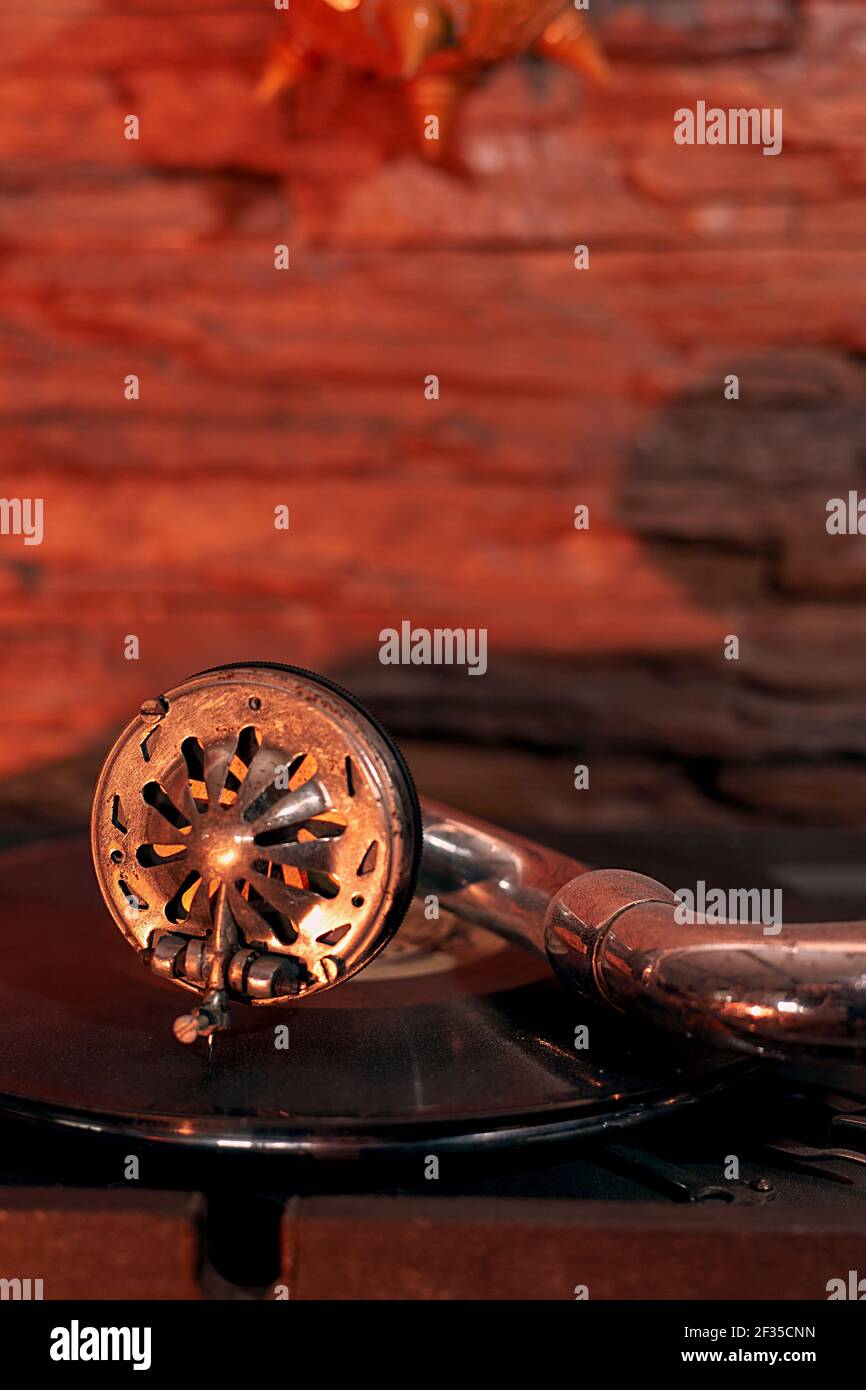 gramophone turntable vinyl records, retro in dust on the background of a stone wall, close-up Stock Photo