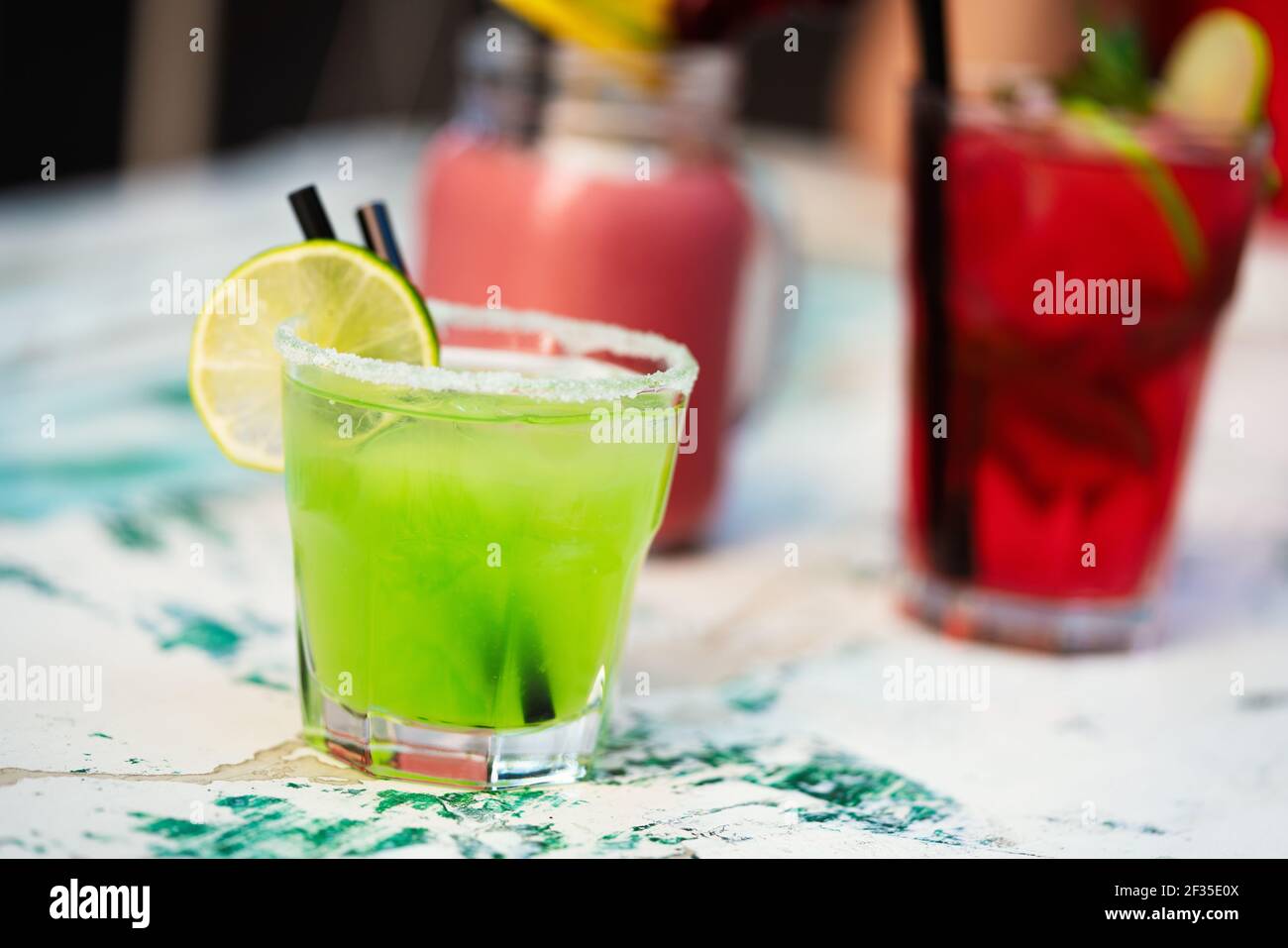 Exotic cocktails, fresh cold alcohol drinks at summer Stock Photo Alamy