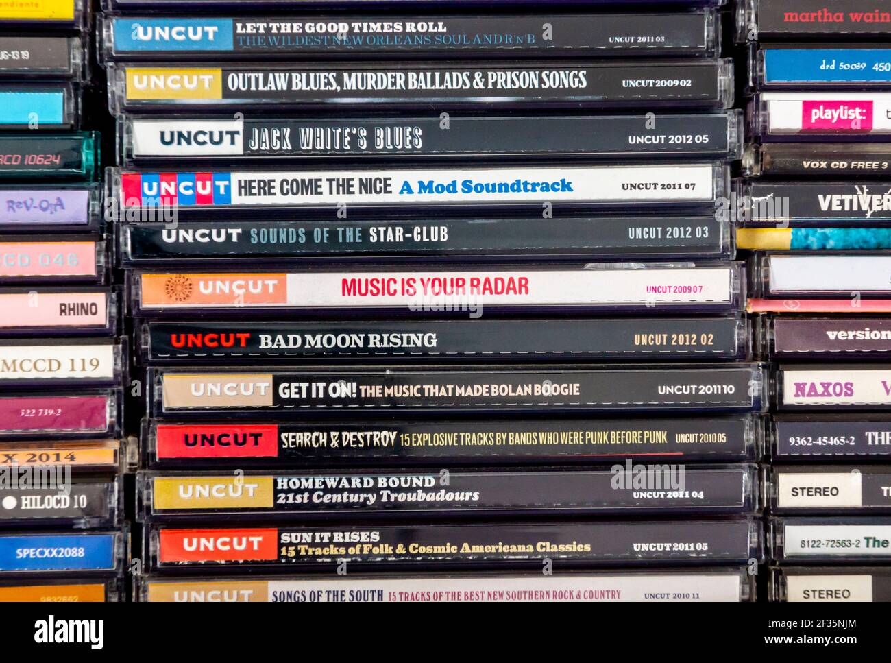 Collection of cds from Uncut a British music magazine that covers heritage rock music with a free cover mounted CD that is given away with each copy. Stock Photo