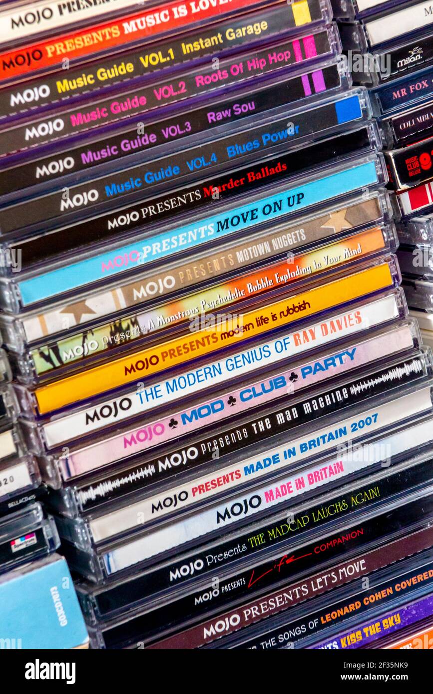 Collection of cds from Mojo a British music magazine that covers heritage rock music with a free cover mounted CD that is given away with each copy. Stock Photo
