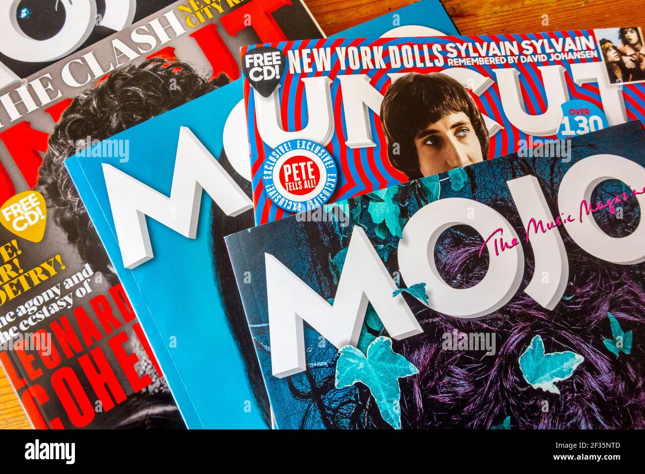 Issues of Uncut and Mojo British music magazines that cover heritage rock  with a free cover mounted CD that is given away with each copy. Stock Photo