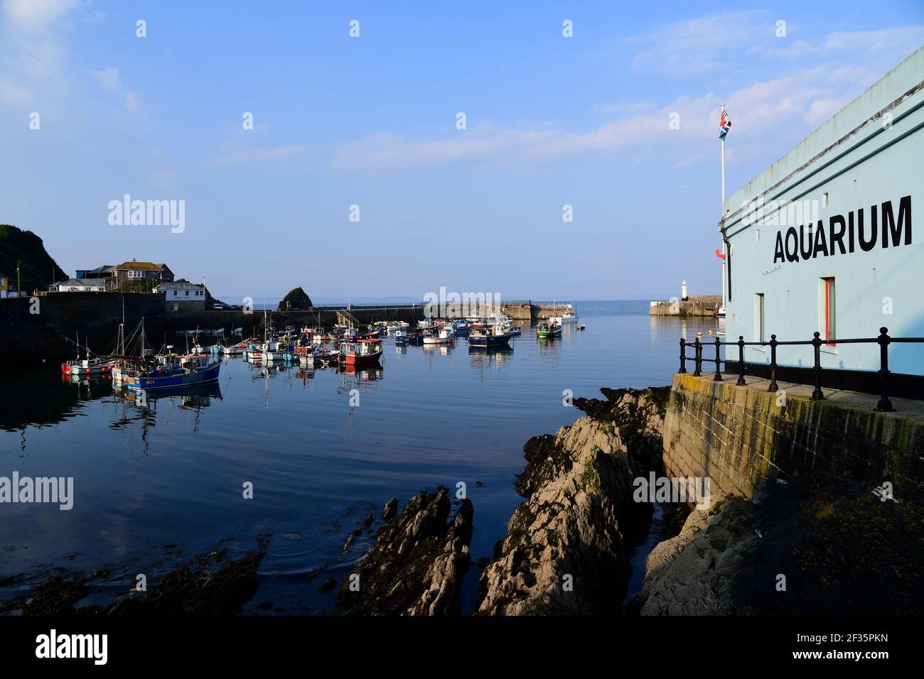 The view from Mevagissey out towards the harbour with the Aquarium in the foreground Stock Photo