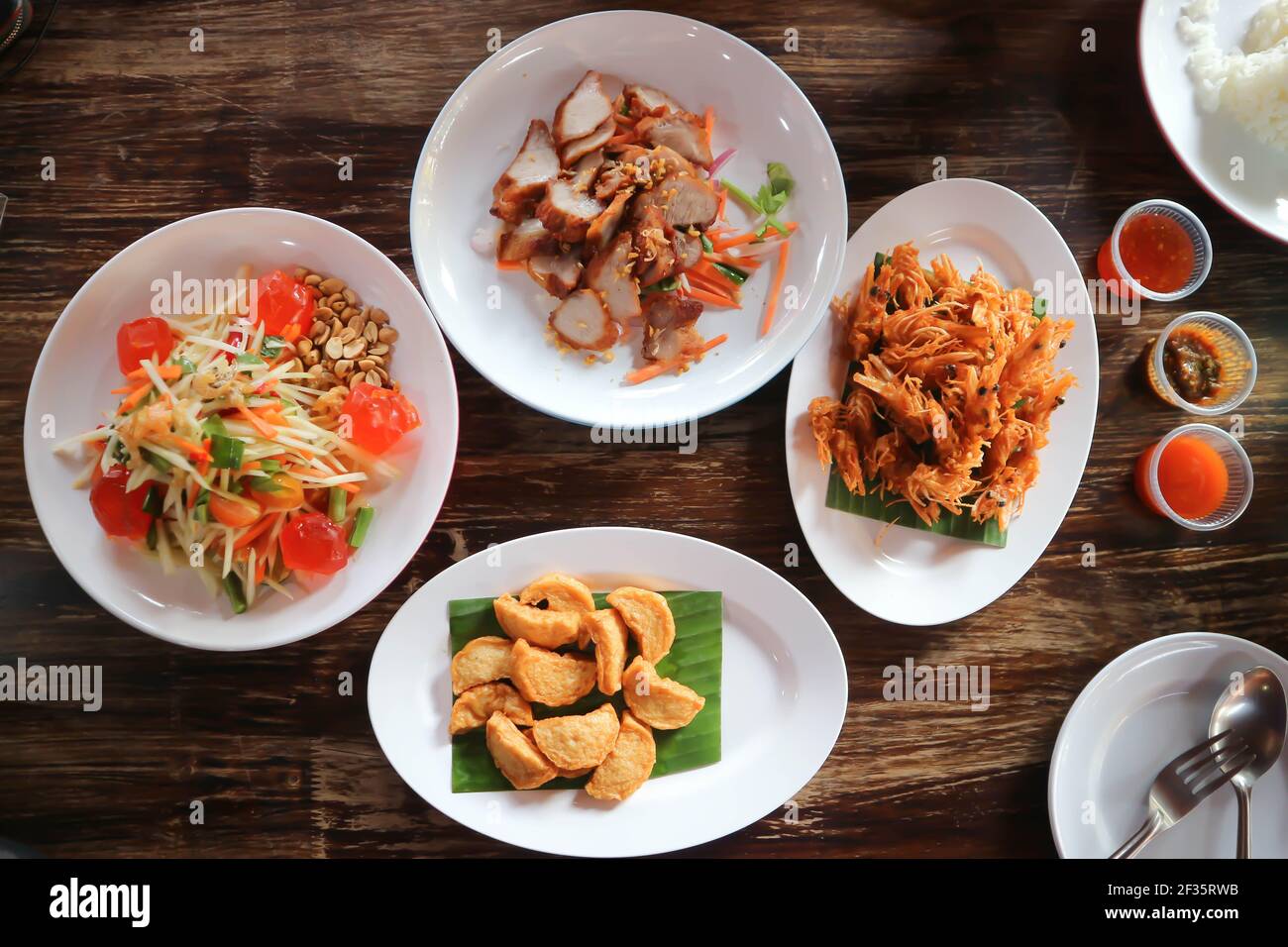 deep fried shrimp, deep fried pork with deep fried sausage and spicy