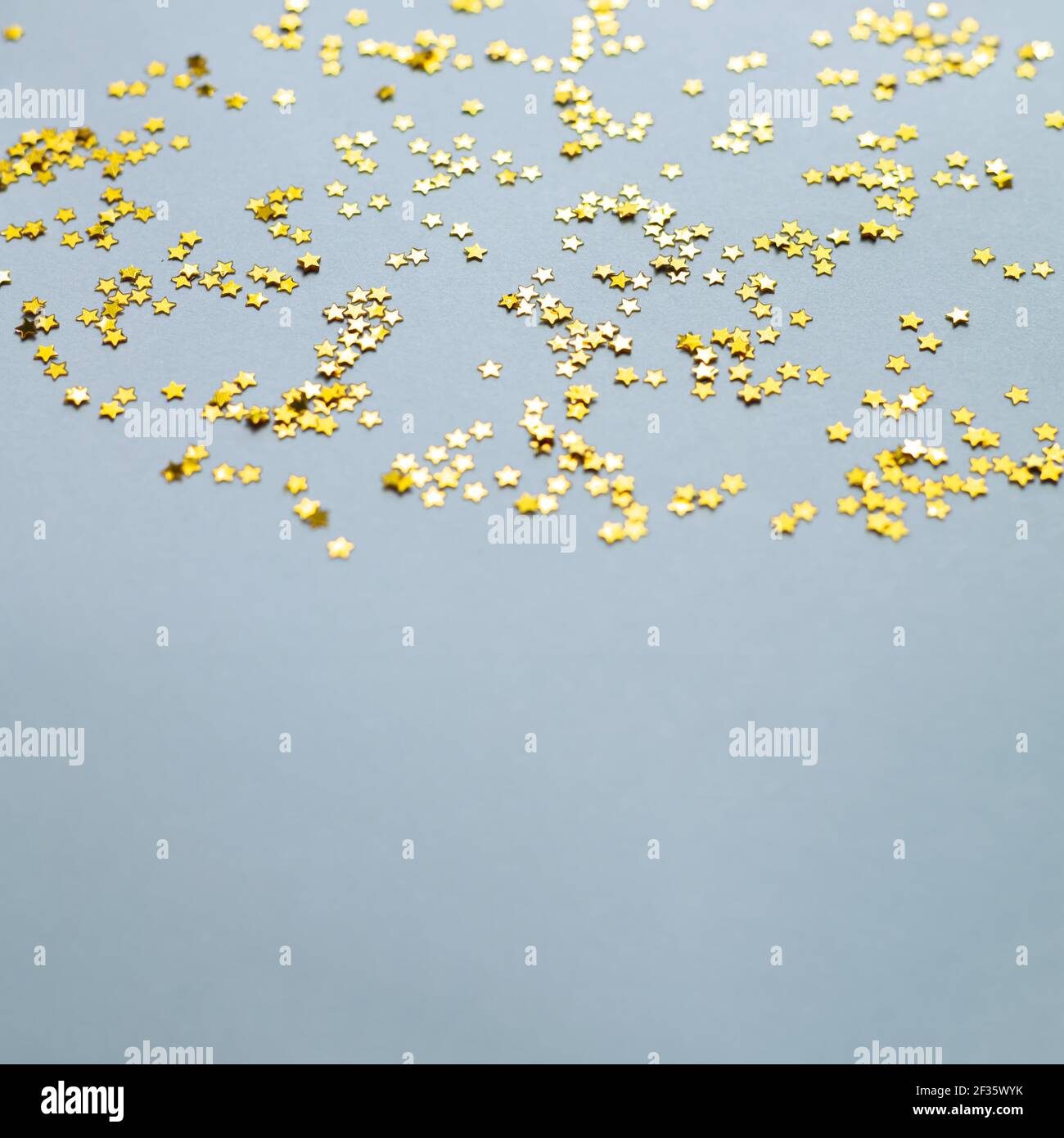Shiny gold star small stars hi-res stock photography and images - Alamy