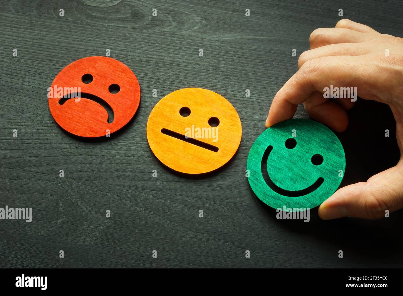 Customer satisfaction evaluation as good rating with smile face. Stock Photo