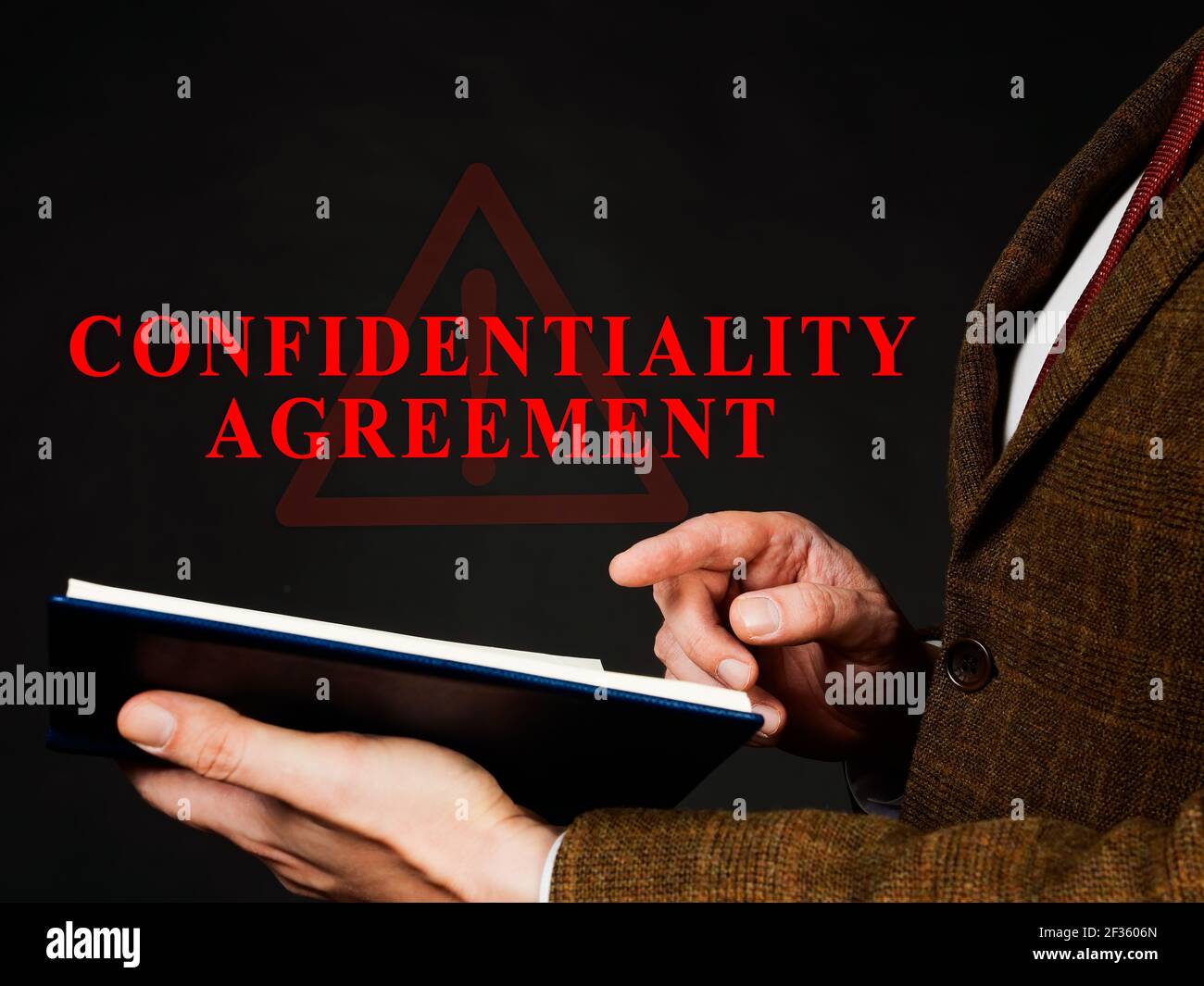 Non-disclosure or Confidentiality agreement in the folder. Stock Photo