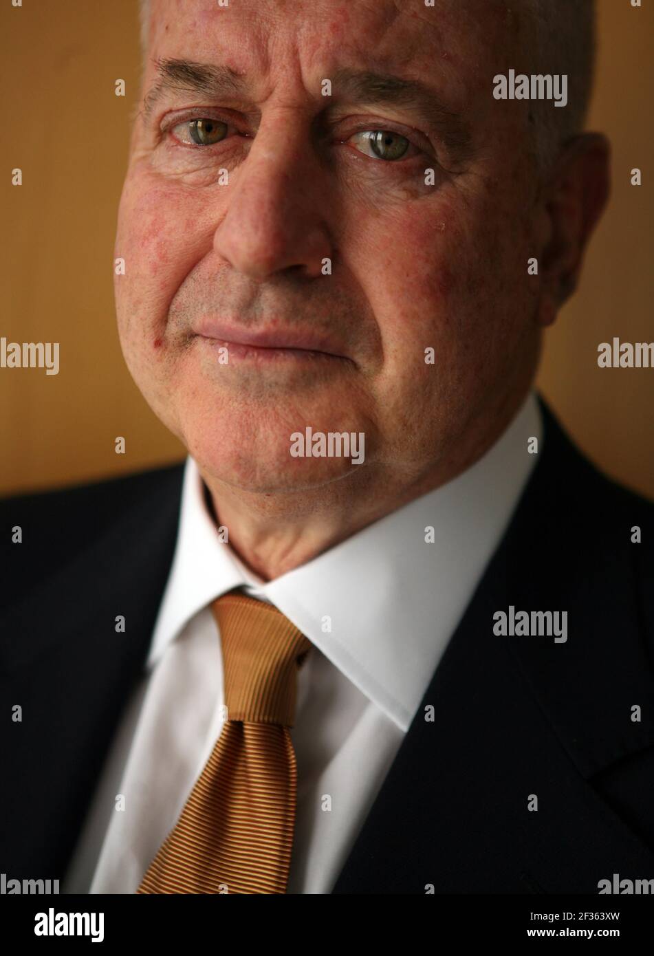 Jules B. Kroll, founder and chairman of KROLL in their London office