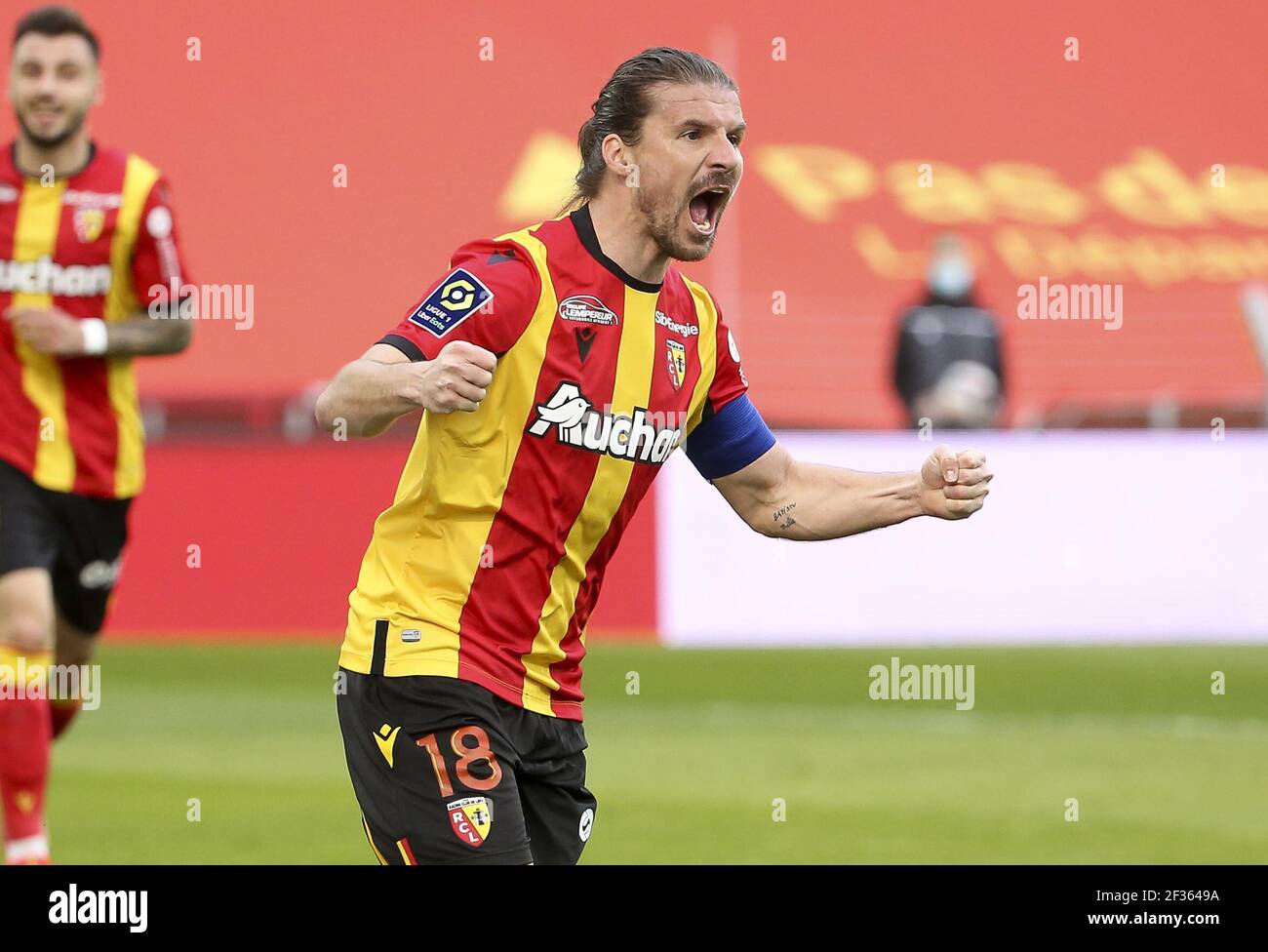 Yannick Cahuzac of Lens celebrates his goal during the French championship  Ligue 1 football match between RC Lens and FC Metz on March 14, 2021 at  Stade Bollaert-Delelis in Lens, France -