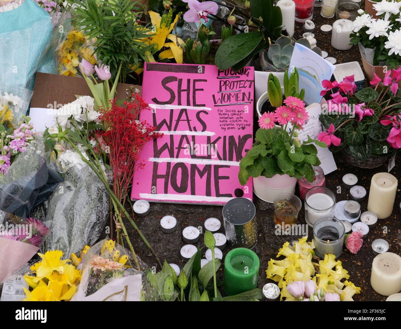 Ms Everard went missing while walking home from a friend's house on 3 March. Her body was later found in woodland in Kent and Met Police officer Wayne Couzens, 48, has been charged with the 33-year-old's kidnap and murder. Hundreds gathered on London's Clapham Common on Saturday to lay flowers and pay their respects to Ms Everard. But officers later handcuffed and removed a number of women from the gathering, arresting four people for public order and Covid offences.Today people attended to lay flowers and pray and pay there respects to Sarah Everard . Stock Photo