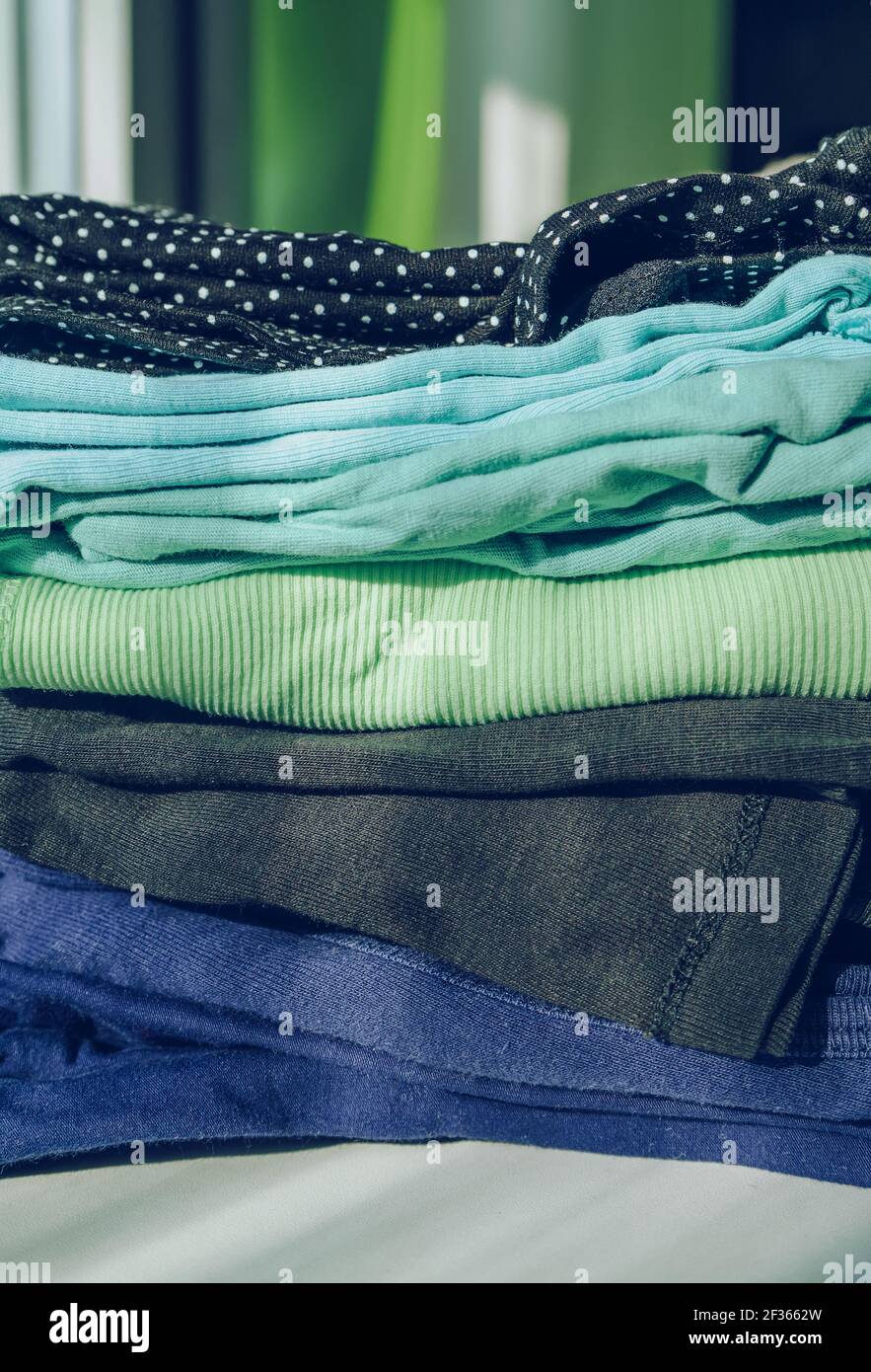 stack of folded colorful woman's tops Stock Photo