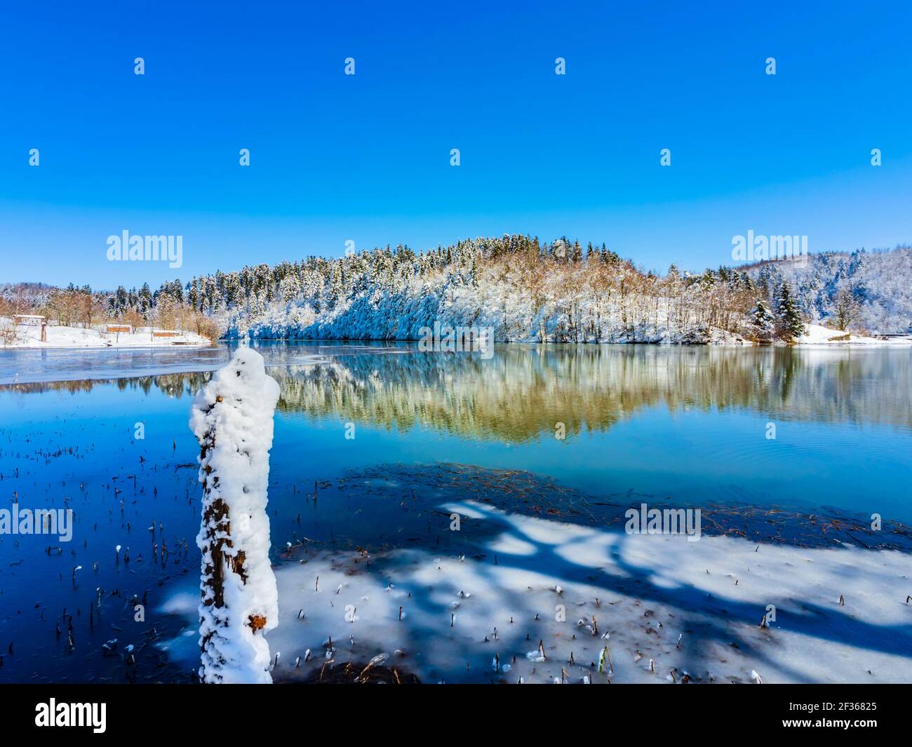 Snow on lake in nature Bajer near Fuzine in Croatia Europe Stock Photo