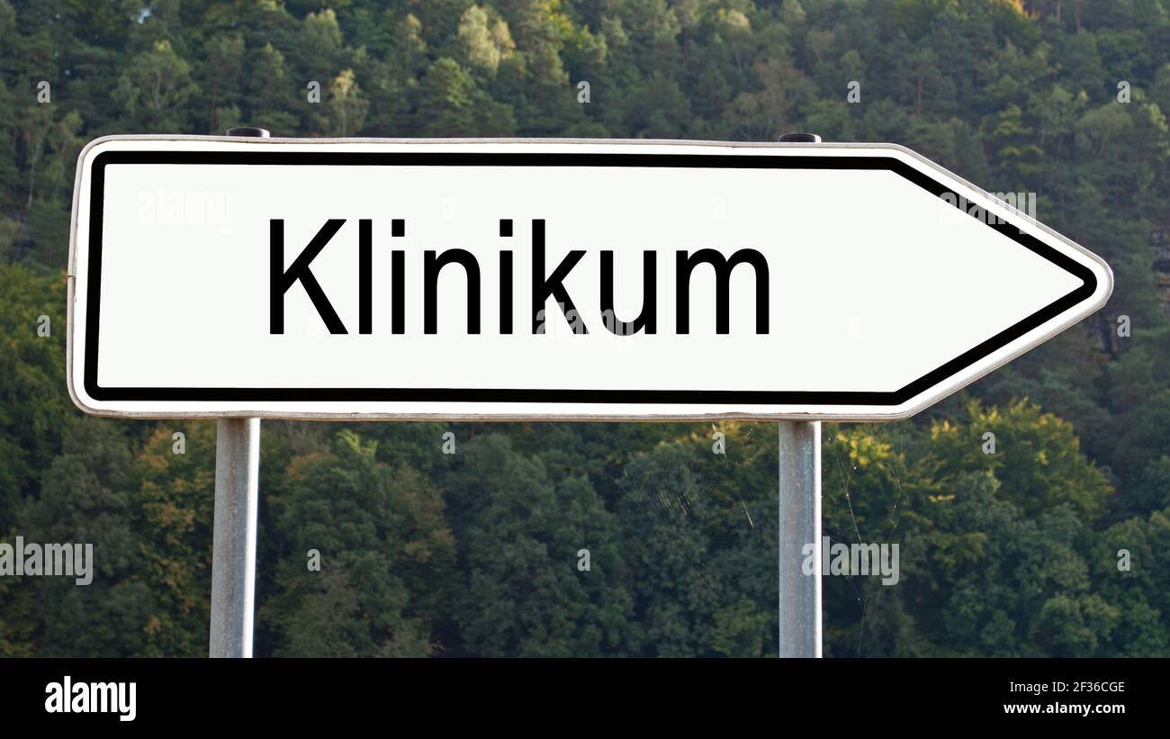 Signpost with the word 'Klinikum', translation 'Hospital' Stock Photo