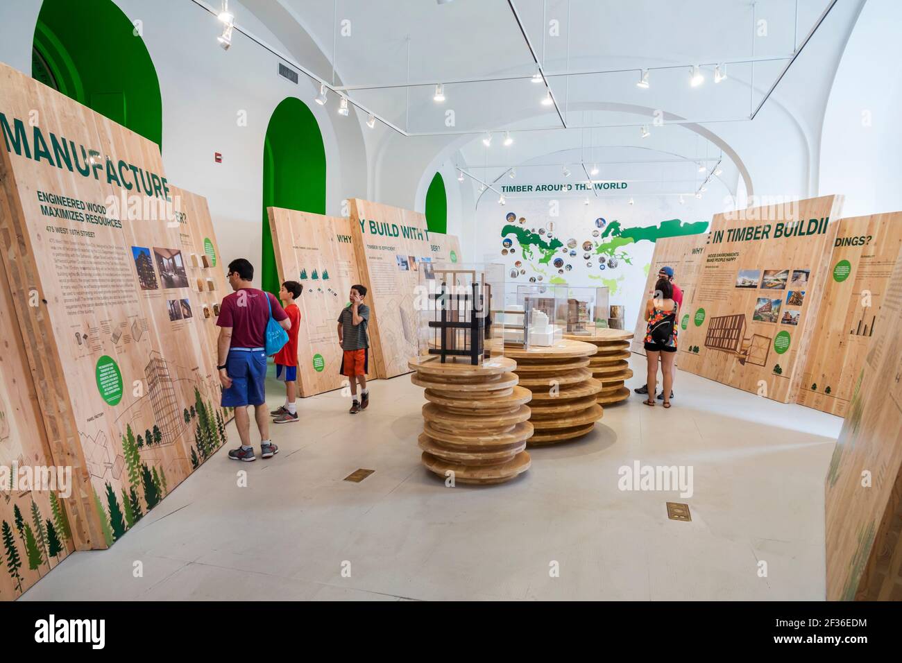 Washington DC,National Building Museum Pension Building,exhibit Timber City wood construction,father son sons boy boys looking reading, Stock Photo