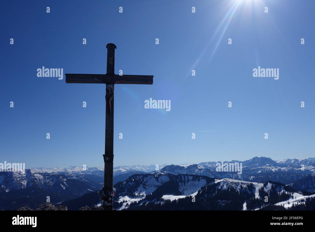 The Jesus Christ cross in the mountain against a blue sky Stock Photo ...