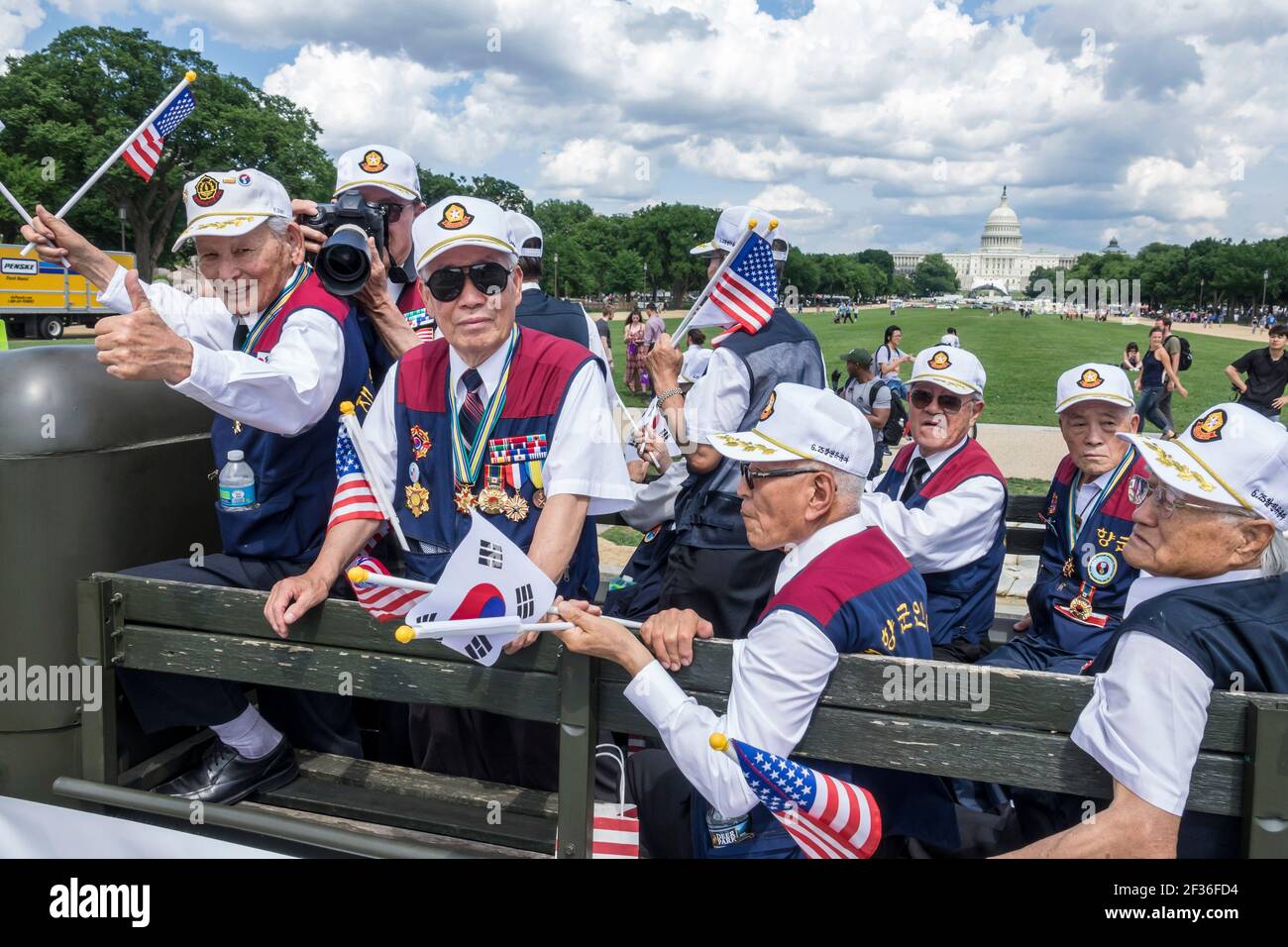 Washington DC,National Memorial Day Parade,Korean War Veterans Association Asian senior men US Capitol building, Stock Photo