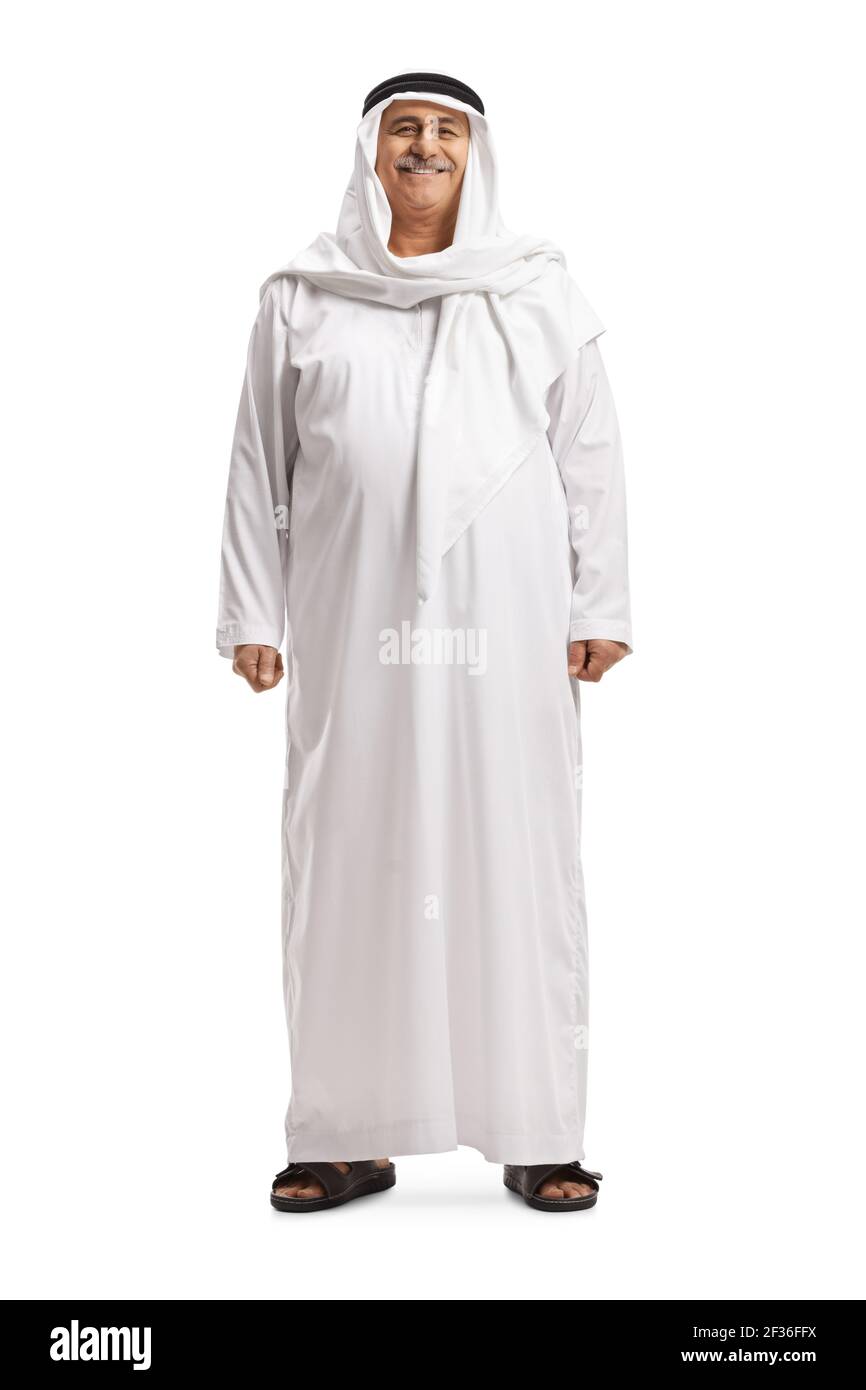 Full length portrait of a mature arab man in a traditional dishdasha isolated on white background Stock Photo