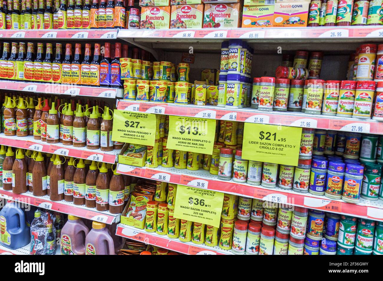 Santo Domingo Dominican Republic,Ciudad Colonia Zona Colonial,Jumbo Express grocery store supermarket shelves seasoning Magi Goya condiments,Spanish l Stock Photo