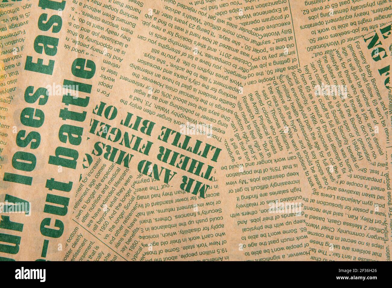 A closeup shot of an old English newspaper background Stock Photo