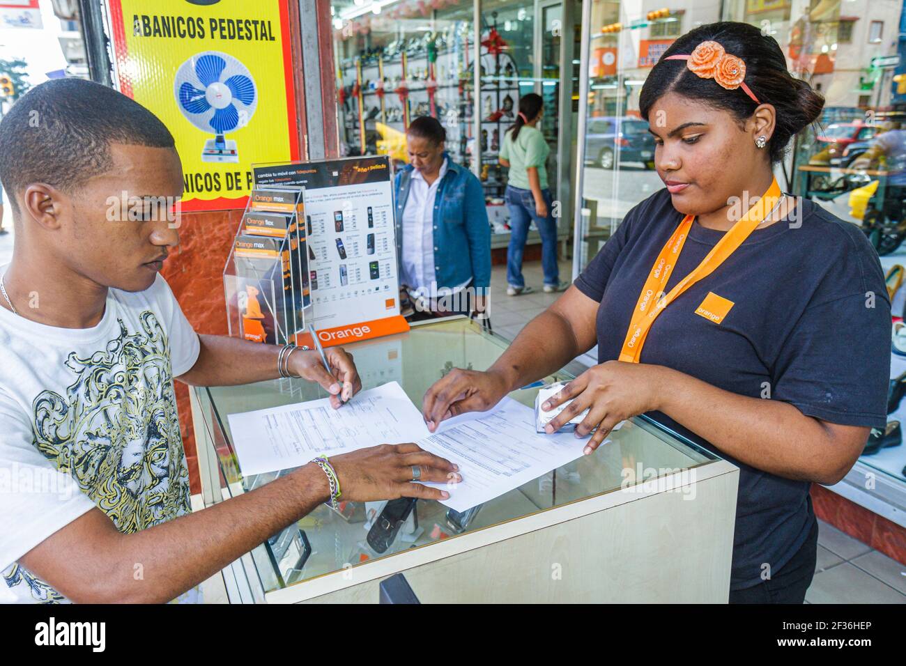 Santo Domingo Dominican Republic,Avenida Duarte electronics store,Black Hispanic man women employee manager customer, Stock Photo