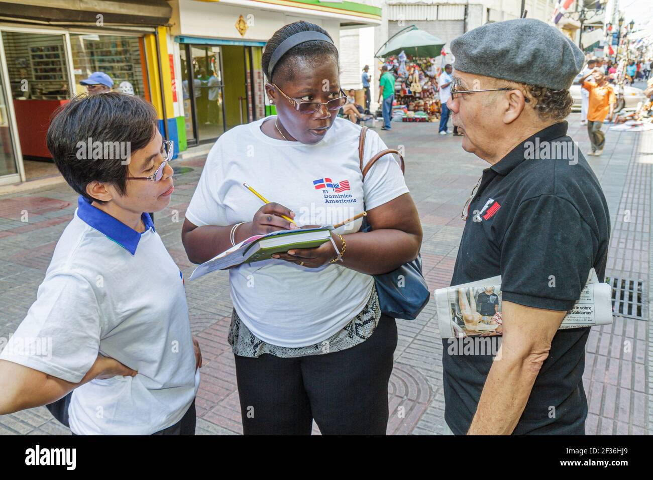 Santo Domingo Dominican Republic,Ciudad Colonial Calle el Conde Peatonal,pedestrian mall survey questionnaire Black Hispanic woman female interviews i Stock Photo