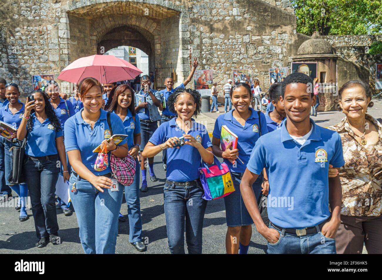 Santo Domingo Dominican Republic,Ciudad Colonial,Puerta Del Conde historic fortress Independence celebration,Hispanic Black students boys girls teens Stock Photo