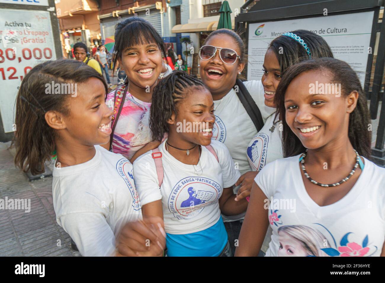 Santo Domingo Dominican Republic,Ciudad Colonial,Calle el Conde Peatonal pedestrian mall,Hispanic Black students girls teens teenagers friends smiling Stock Photo
