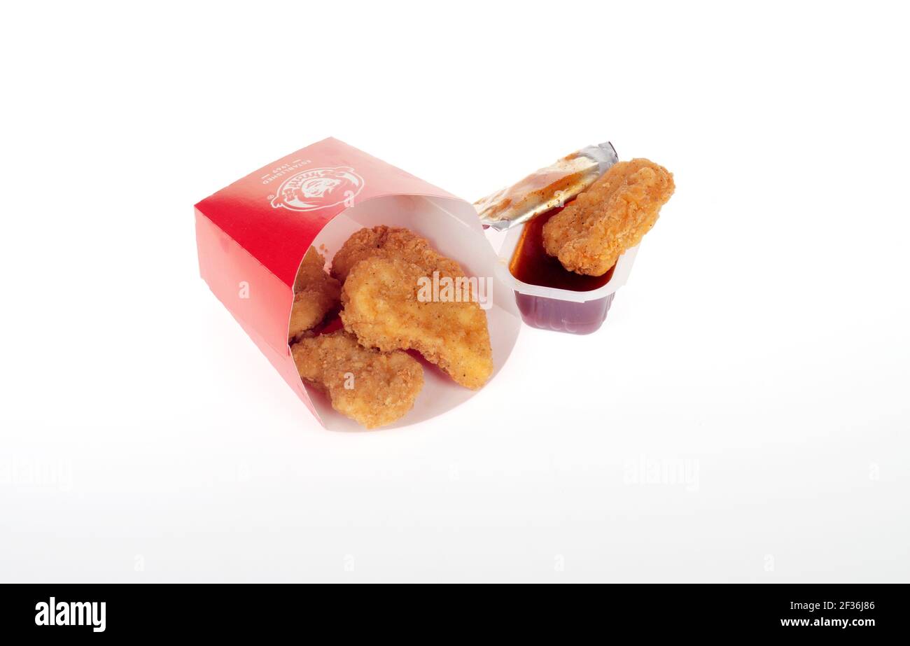 Wendy's Chicken Nuggets in Container on White with BBQ Dipping Sauce Stock Photo